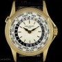 Patek Philippe World Time Gents 18k Yellow Gold Cream Dial 5110J-