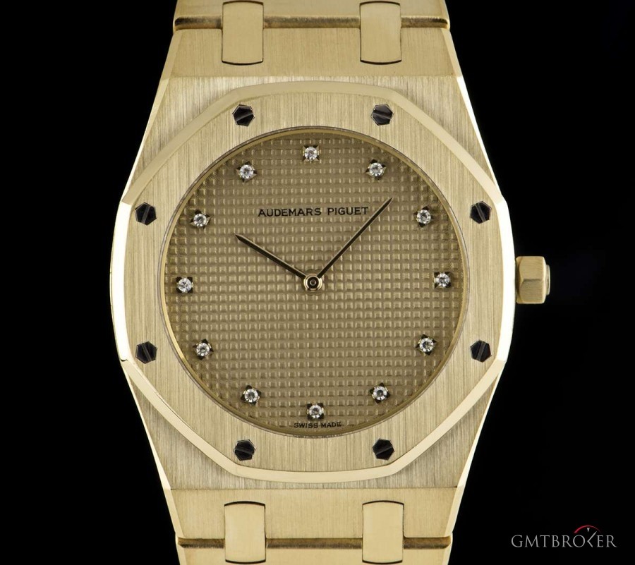 Audemars Piguet Royal Oak Mid-Size 18k Yellow Gold Champagne Diamo nessuna 811028