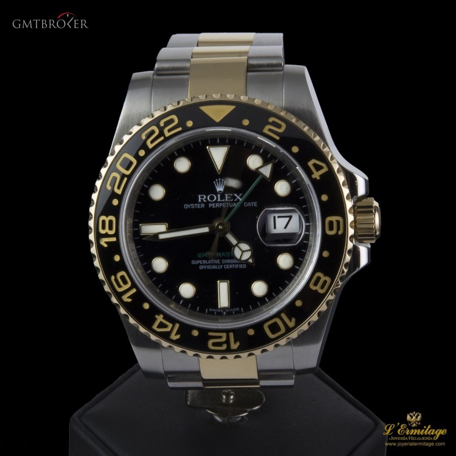 Rolex GMT MASTER II STEEL AND GOLD 116713LN 306913